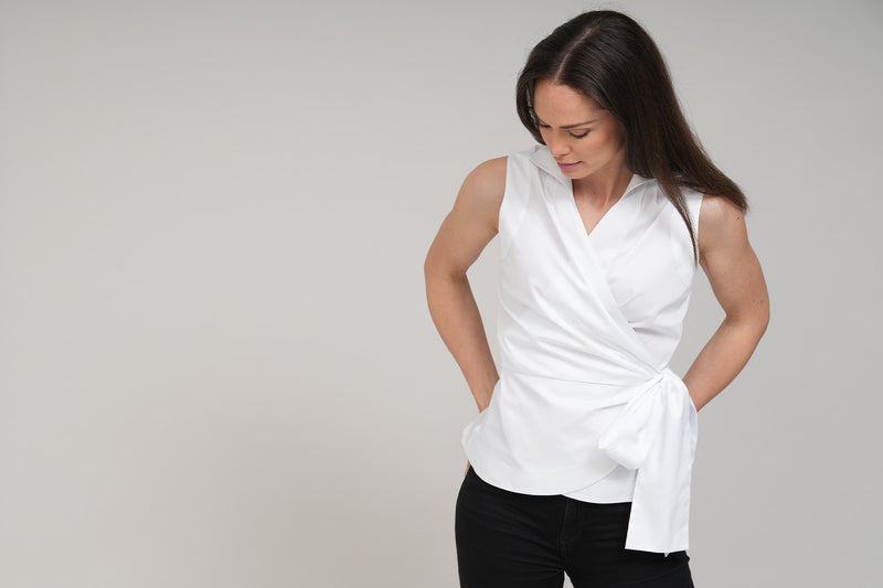 ABBY WRAP AROUND SLEEVELESS COTTON SHIRT WITH BOW IN WHITE