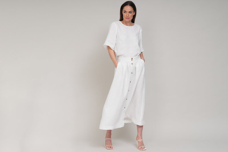 CLARETTE BUTTON FRONT LINEN MIDI SKIRT IN WHITE