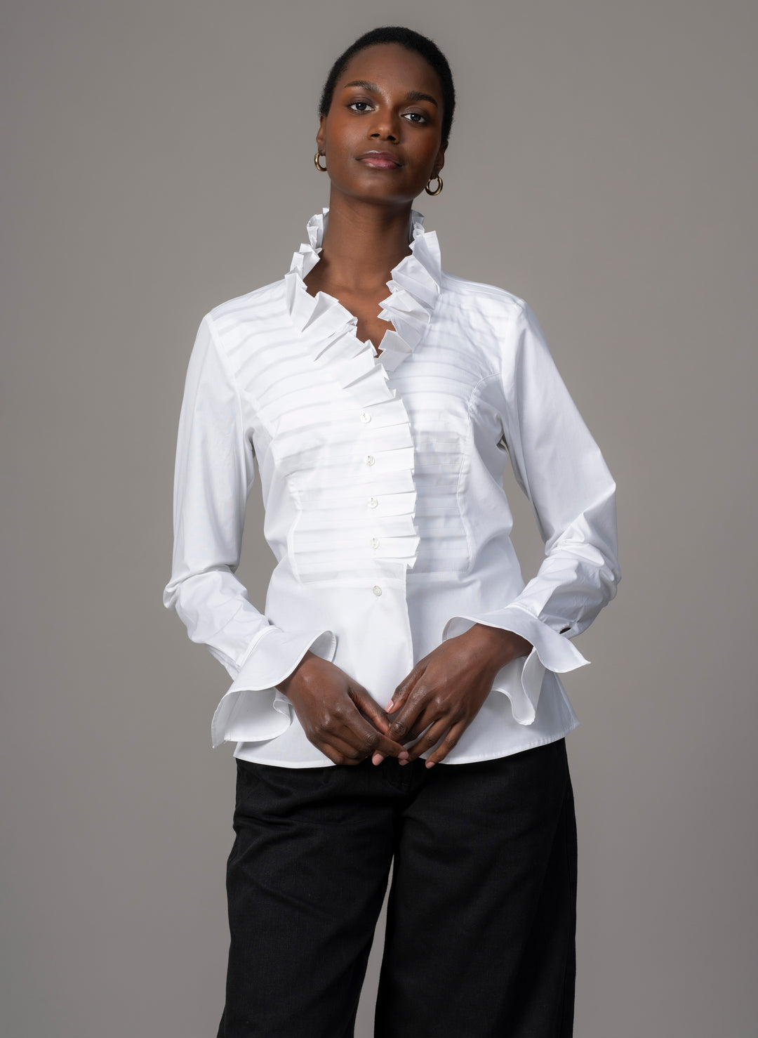 white shirt with ruffle bottom