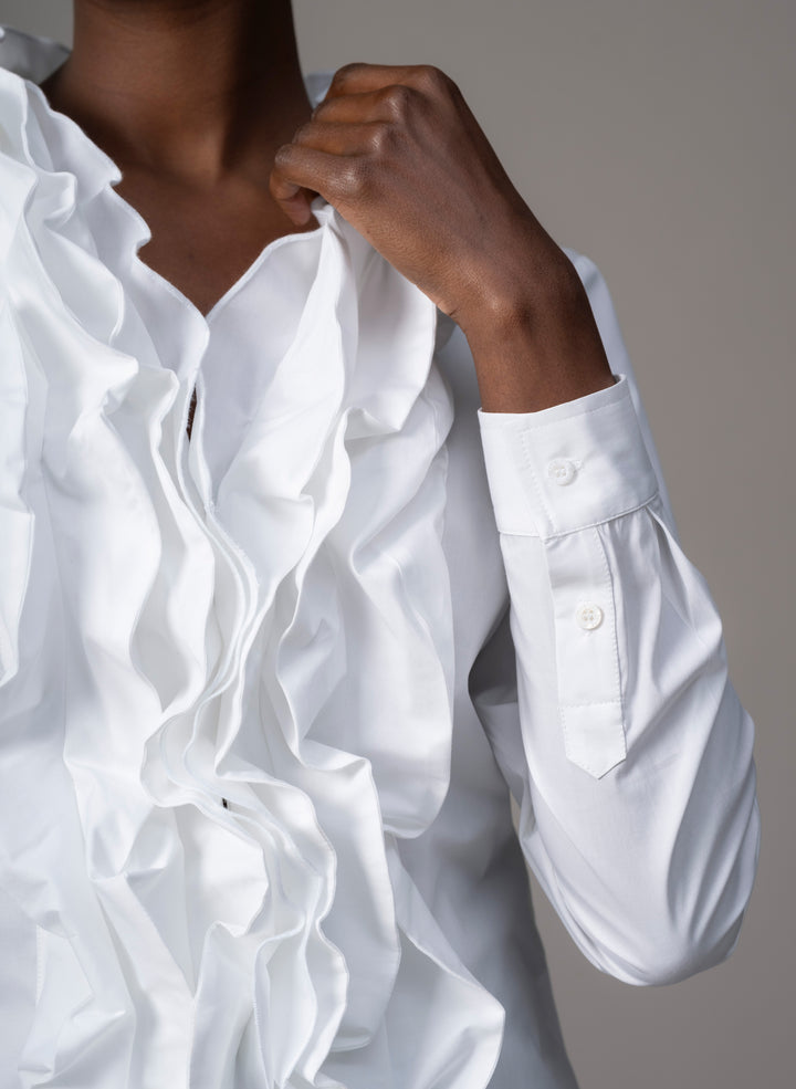 white silk blouse with a frill