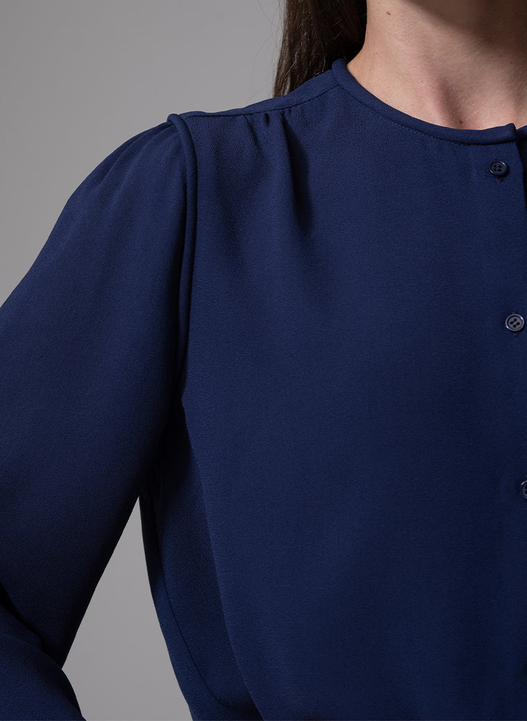 NICOLA ROUND NECKLINE EVERYDAY BLOUSE WITH PIPED TRIM IN NAVY BLUE