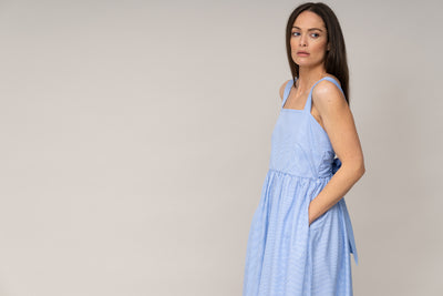 PALM BEACH SLEEVELESS COTTON SUNDRESS WITH BOW IN BLUE/WHITE MINI STRIPE