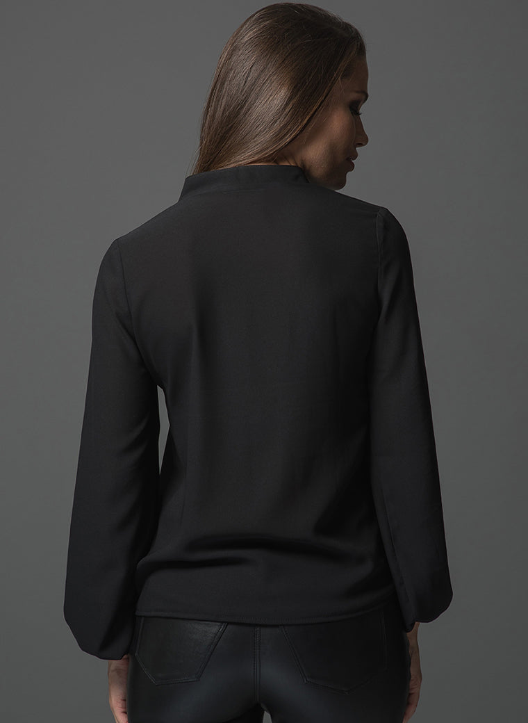 Victoria black ruffle work blouse viewed from the back
